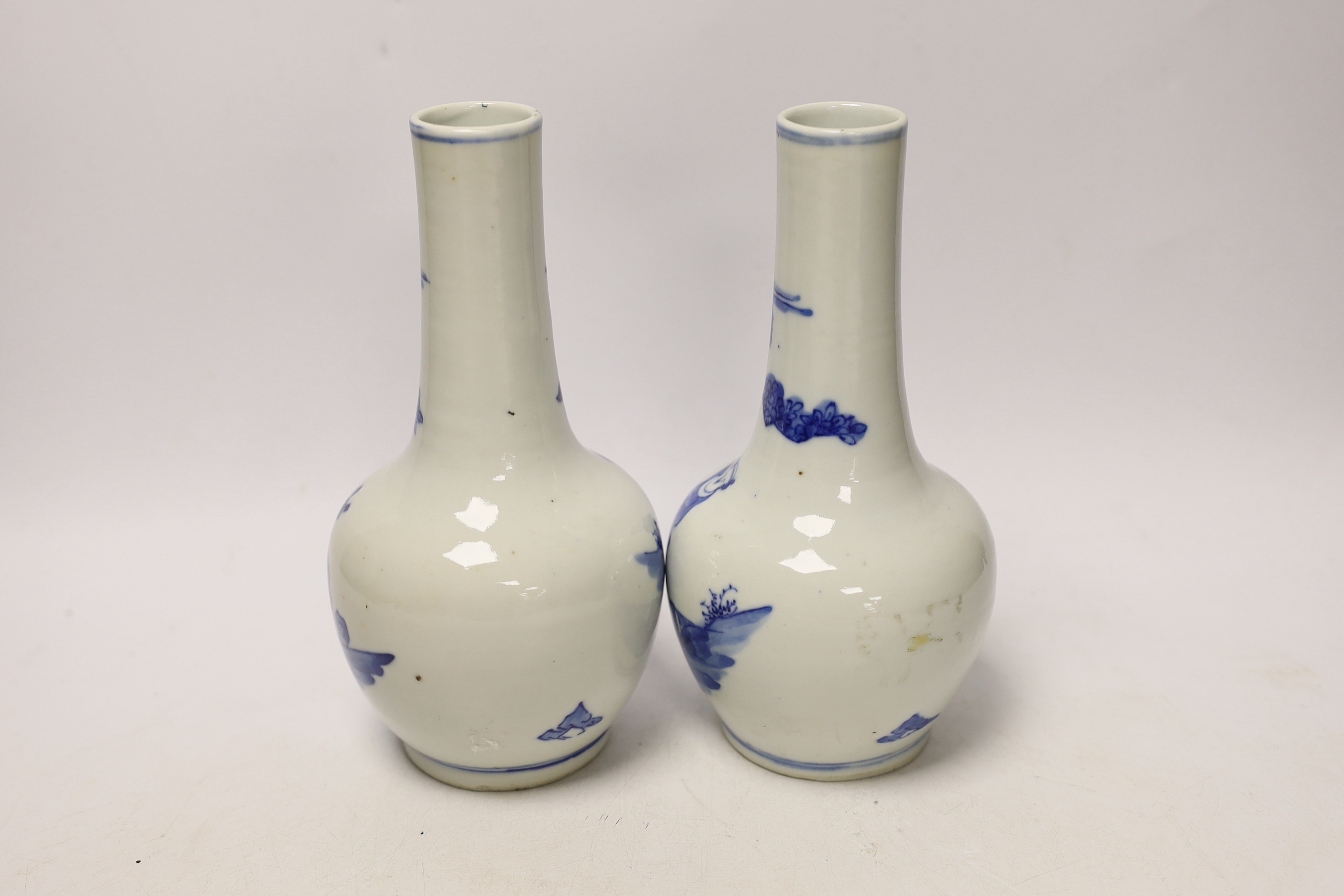 A pair of Chinese blue and white bottle vases, 19th century, 21cm high